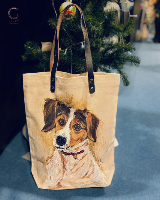 Tote bag with a dog illustration in front of a Christmas tree