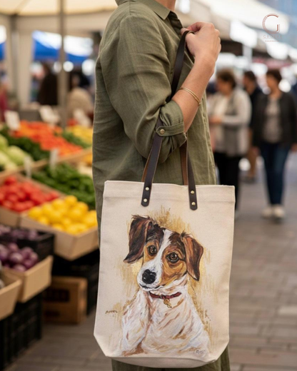 Person holding a tote bag with a dog illustration in a market setting
