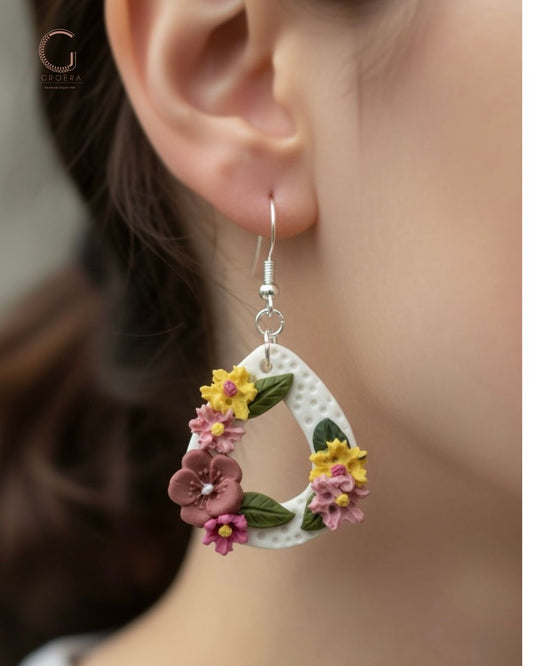 Handmade with polymer clay earrings with figure